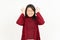 Angry Gesture Of Beautiful Asian Woman Wearing Red Shirt Isolated On White