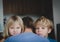 Angry kids hug father, negative emotions in family