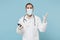 Angry male on-line doctor man in medical gown face mask gloves isolated on blue background. Epidemic pandemic