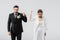 Angry multiethnic bride and groom in