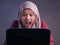 Angry Muslim Businesswoman Working on Laptop at the Office