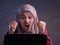 Angry Muslim Businesswoman Working on Laptop at the Office