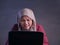 Angry Muslim Businesswoman Working on Laptop at the Office