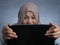 Angry Muslim Businesswoman Working on Laptop at the Office