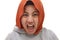 Angry muslim girl in hijab screaming loud, close up portrait