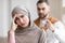 Angry Muslim Husband Shouting At Unhappy Wife Standing At Home