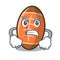 Angry rugby ball mascot cartoon