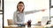 Angry strict woman gesturing to exit in office