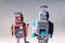 Angry vintage tin toy robots, artificial intelligence, robotic delivery concept