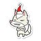 angry wolf sticker cartoon of a wearing santa hat