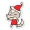 angry wolf sticker cartoon of a wearing santa hat