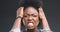 Angry, woman and frustrated face in studio with dark background and mockup space. Crazy, anger and portrait of person