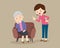 Angry woman scolding to elderly woman sitting on sofa