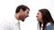 Angry young couple shouting at each other