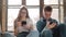 Angry young teens using smartphone