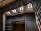 Angular staircase in the century old Obecni dum Municipal House in Opava, Czech Republic with railing and staircase with a