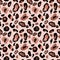 Animal skin seamless pattern on pink background. Watercolor hand painted leopard print with brown, beige and black spots