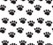 Animal tracks seamless pattern. Dog paws traces repeating texture, endless background. Vector illustration.