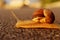 Animals, Nature Concept. Snail On The Road Over Green Grass Background.