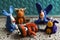 Animals rabbits, cows and fish from multi-colored plasticine, which hardens. Children`s creativity. Funny clay toys