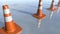 Animated traffic cone pilons in a row. 3D rendering 4K