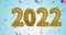 Animation of 2022 gold balloon numbers and confetti on blue background