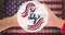 Animation of 4th of july text over person making heart shape with hands over american flag