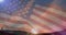 Animation of american flag over stunning sunset landscape