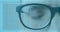 Animation of blinking eye of man in glasses with interface and fast scrolling digital information