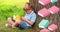 Animation of books moving over boy reading book sitting on grass