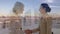 Animation of businesswomen handshake over cityscape