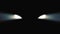 Animation of car headlight on black background. Luminous headlights of automobile contrast with black background