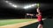 Animation of caucasian female handball player holding ball over sports stadium