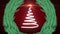 Animation of christmas tree formed with white ribbon and fir tree wreath