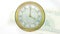 Animation of clock ticking over american dollar currency banknote