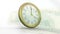 Animation of clock ticking over american dollar currency banknote