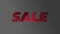 Animation of dots in red sale text against gray background