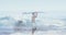 Animation of double exposure of surfing people