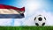 Animation of flag of netherlands and football over stadium