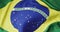 Animation of football over flag of brazil with copy space