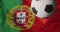 Animation of football over flag of portugal with copy space