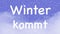 Animation of german words winter is coming on blue background with snow and fog