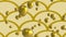 Animation of gold balloons floating on repeated gold curve pattern on beige background