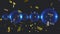 Animation of gold confetti falling over sparkling translucent blue balls, floating on black