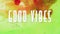 Animation of good vibes text over close up of liquid and baubles