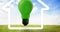 Animation of green light bulb in white house icon over blue sky and grass