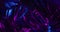 Animation of green lush leaves over purple background with neon purple lighting