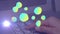 Animation of green and yellow blobs and moving spotlight over hand using numeric keypad