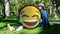 Animation of happy emoji over woman outdoors