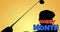 Animation of hobby month text in red and blue over silhouette of golfer swinging golf club on yellow